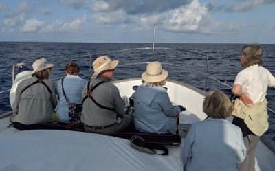 After an early first breakfast on the boat, some of us sat out on the bow to see what we could see: Jane, Pat, Bill, Mary T, Jan and Annabel 