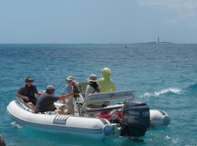 First group in the dinghy to Garden Key with Loggerhead Key in the background