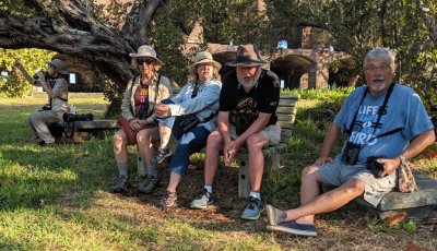 Phoenix sees a bird behind Jane, Mary T, Lou and Dave