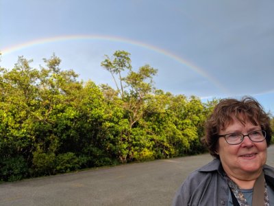 Suddenly a double rainbow appeared with one end coming out of Mary's head.
