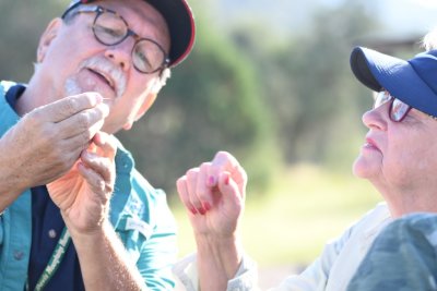 Nancy V gets a close-up look at a Ruby-throated Hummingbird.