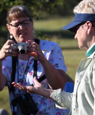 Nancy V with a Ruby-throated Hummingbird in her hand