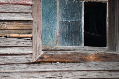 Siding and window in outbuilding