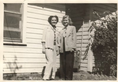 Jackie and Mary Lou on the south side of the Harris house on S May Ave