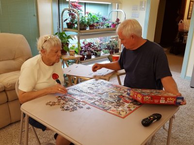 Jackie and Steve working a puzzle, Sep 16, 2017
