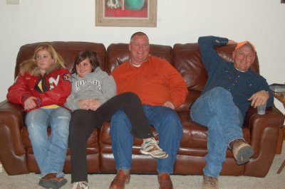 Chris' daughters, Chris and Greg on the couch at Mom & Dad's, Mustang, OK, Feb 28, 2009