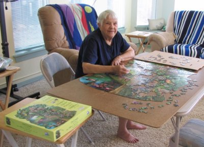 Jackie working a puzzle at Steve and Mary's, Oct 1, 2015