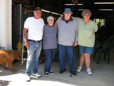 Pepper, Jackie, Bill and Kathy in the doorway of one of Pepper's storage buildings, Sep 3, 2008