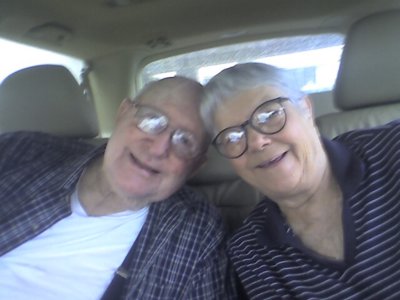 Bill and Jackie acting goofy in the back seat of their Honda Odyssey in OKC, Sep 10, 2008