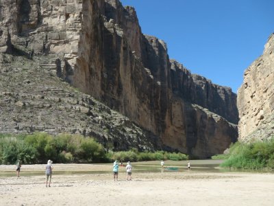 Steve, Nancy R, Nancy V and Patti in the distance with some folks putting a canoe into the water at Santa Elena Canyon