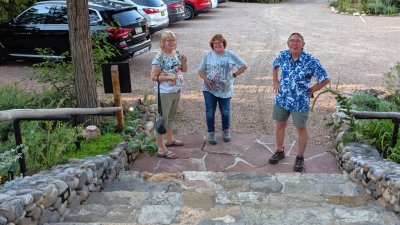 Cheryl, Mary and Kent, at the bottom of the steps leading up to the hotel