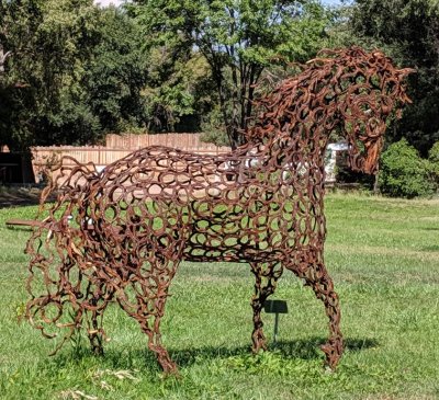 A horse made of horseshoes