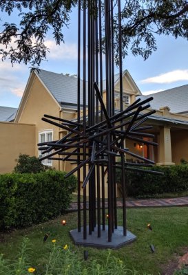 We walked to dinner in downtown Santa Fe and passed this front yard sculpture along the way.