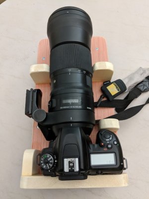 The added smaller pieces of wood do help limit the camera's side-to-side and forward movement.