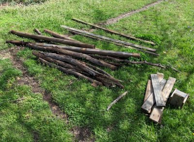 These are the pieces that remained of the old feeder tree frame after I disassembled them. We had inserted some branches trimmed from trees in the yard to provide vertical support for the trumpet vine.