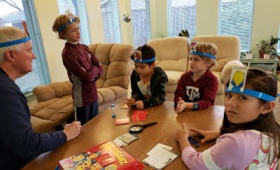 We took all the kids to our house while Jeremy and Cindy went to their hotel to pack, and Seth and Angela packed at our house. We used our time to play some more Hedbanz!