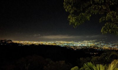 The view of San Jos at night from the back lawn of the Buena Vista Hotel, Alajuela, Costa Rica