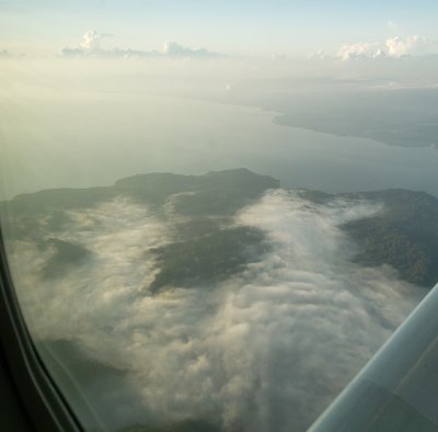 Fog still lay in the valleys near the coast.