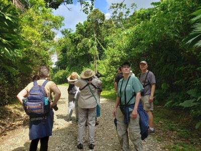 We got out of the bus on the road into a refuge and found birds on both sides of us.
Deb (behind Monica), Monica, Fran, Ann, Derek, Leigh, Carolyn (behind Leigh), Steve