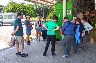Outside the Neily mercado, Chito showed the group what he had purchased; Derek, Tom, Fran, Deb, Monica, Jody (behind), Chito, Ann, Mary and Carolyn