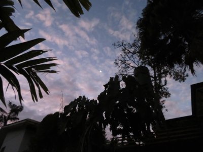 At 5:30AM, when we gathered outside our rooms for our morning walk, the moon was still shining, though the clouds were beginning to reflect a little sunlight from below the horizon.