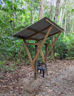 On the path to our room, we noticed this covered rest stop and thought it strange that it had only a single chair. Later that night, as we went to our room, we found a 'sentry' at this spot.