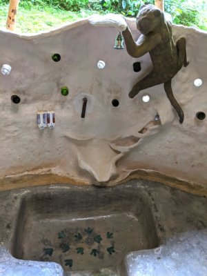 When we got into our room, after it had been cleaned, we were surprised to see the artful design of the bathroom--and to find that it was open to the elements--the elements being anything that wanted to fly or climb or slither over the wall.