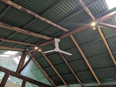 There was a ceiling fan and floor fan to help offset the 90-degree midday heat and high humidity.