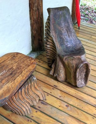 Carved chairs on our porch