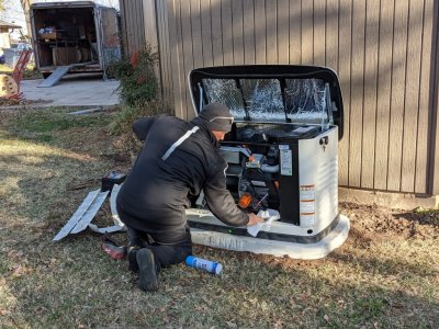 After attaching the unit to the concrete base, Aaron carefully wiped it all clean.