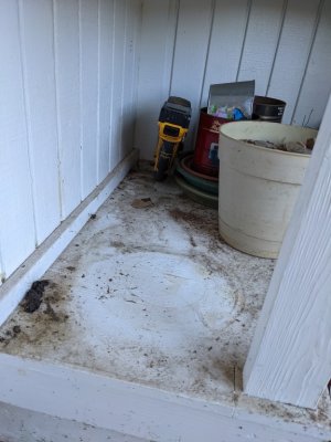 The hole was drilled from the outside, where the power box is, into the garage.