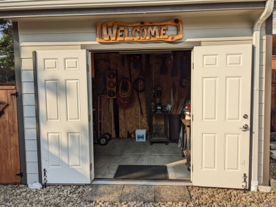 Pepper's work shed
The 'Welcome' sign was cut from a single piece of wood.