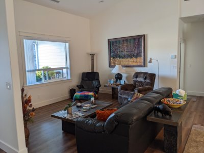 The front room den/TV/living space - a cozy gathering place with a nice view.