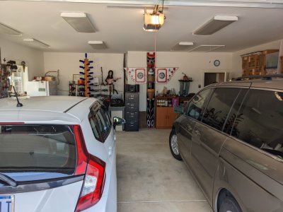 Looking into the garage from the driveway, you can see the totem pole and other memorabilia they brought with them from Powers.