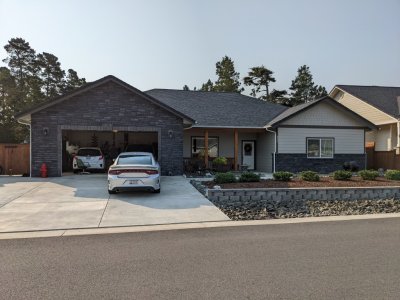 Looking at their house from across the street