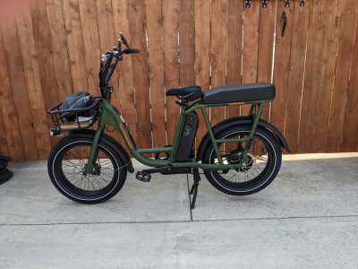 Another photo of Pepper's motorized bike that he uses to tour the neighborhood. No word on whether Jackie or Kathy ride on the back seat.
