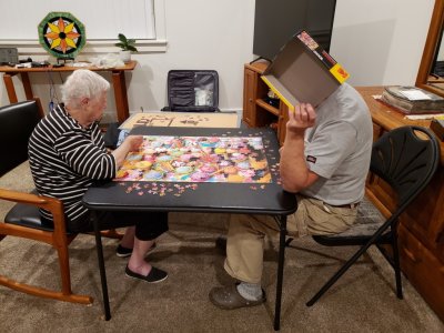 Back in Florence, Jackie and puzzle-box-head got serious about finishing that 1000-piece ice cream puzzle.