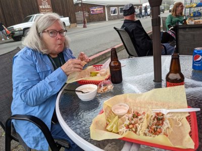 Mary, chowing down on a *perfect* fish taco.
