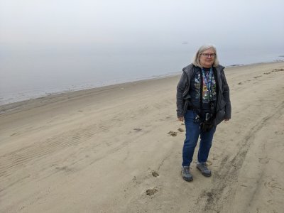 Mary on the foggy shore of the Siuslaw River, our last stop on the way out of town