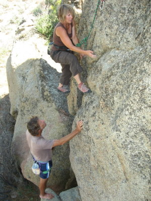 Mi amor helping me get up the rock