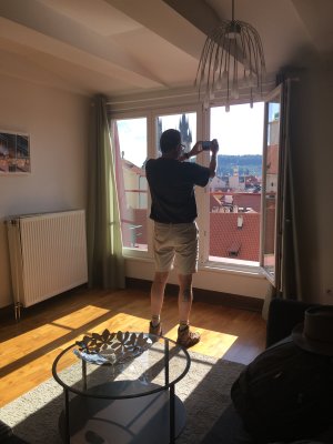Jim enjoying the view from our Prague apartment