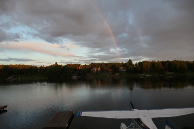 Rainbow over a plane on Campbell Lake