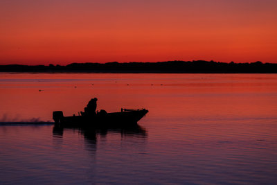 Fishng boat on the Bay of Quinte before sunrise