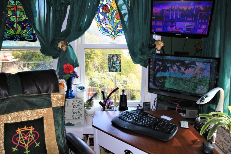 my desk with a view of the garden .jpg