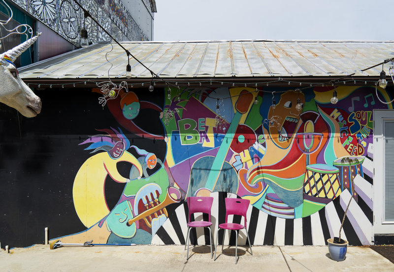 Busybody Checking Out Mural 