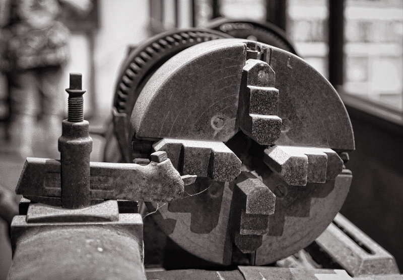 Four Jaw Chuck and Cutter On An Ancient Engine Lathe