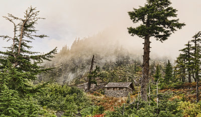 Cabin Nestled in a Canyon