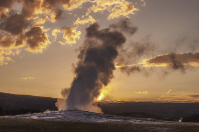 Old Faithful under sunset
