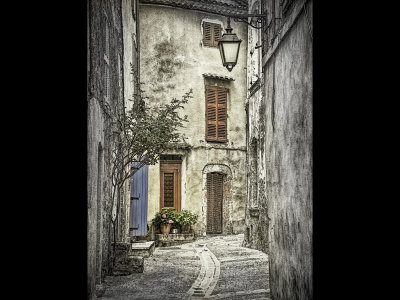 Blue door, lamp and village street