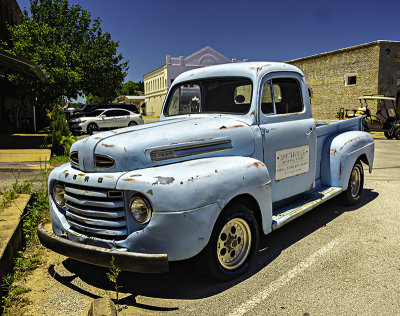Smithfield General Store business vehicle. (The sign on the truck reads, Smithville General Store, Small Town, Big Heart)
